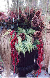 Add pinecones and faux berries
